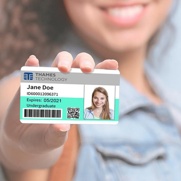 Woman holding an ID Card